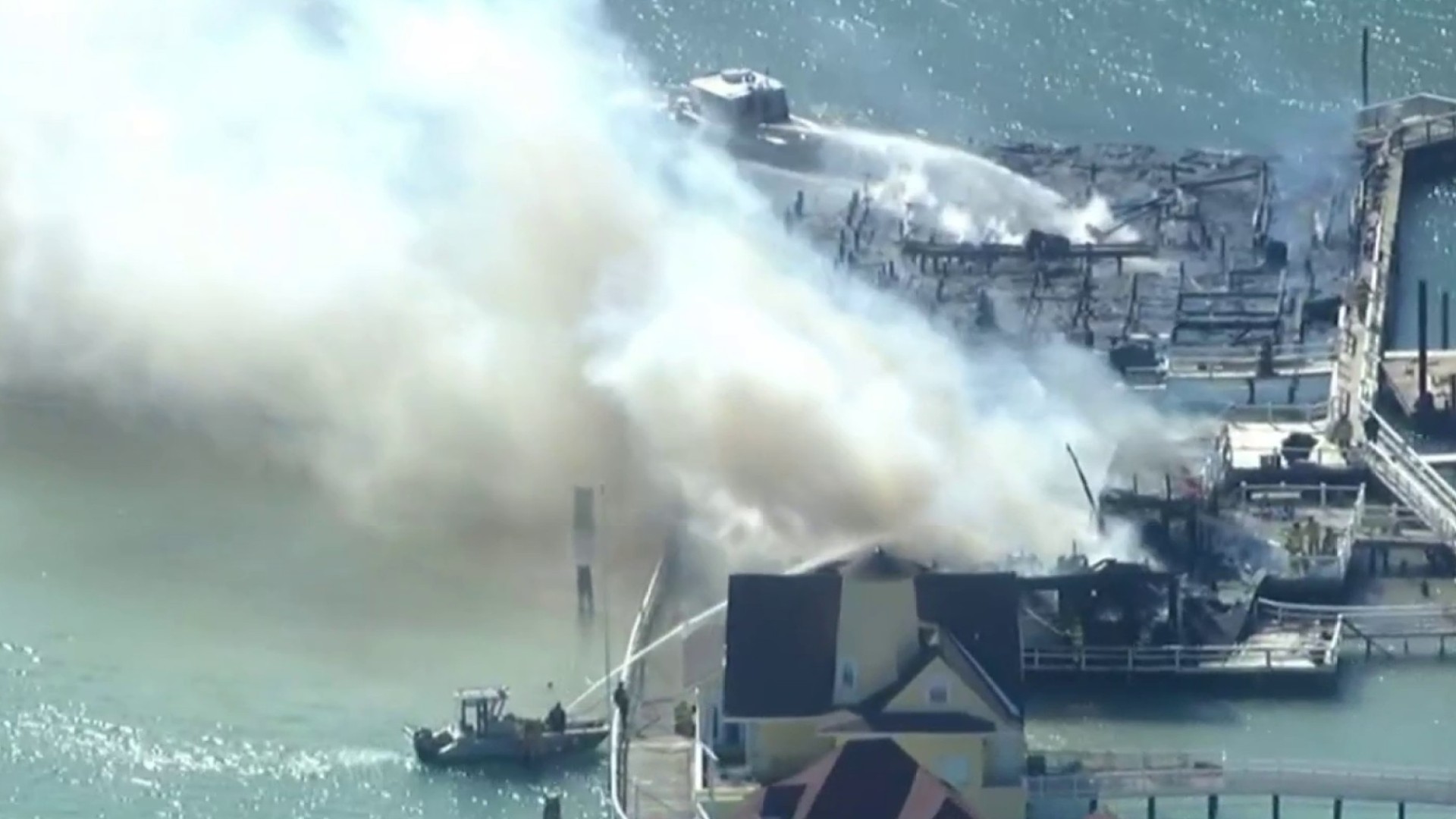 Crews battle massive fire at historic yacht club on Harsens Island