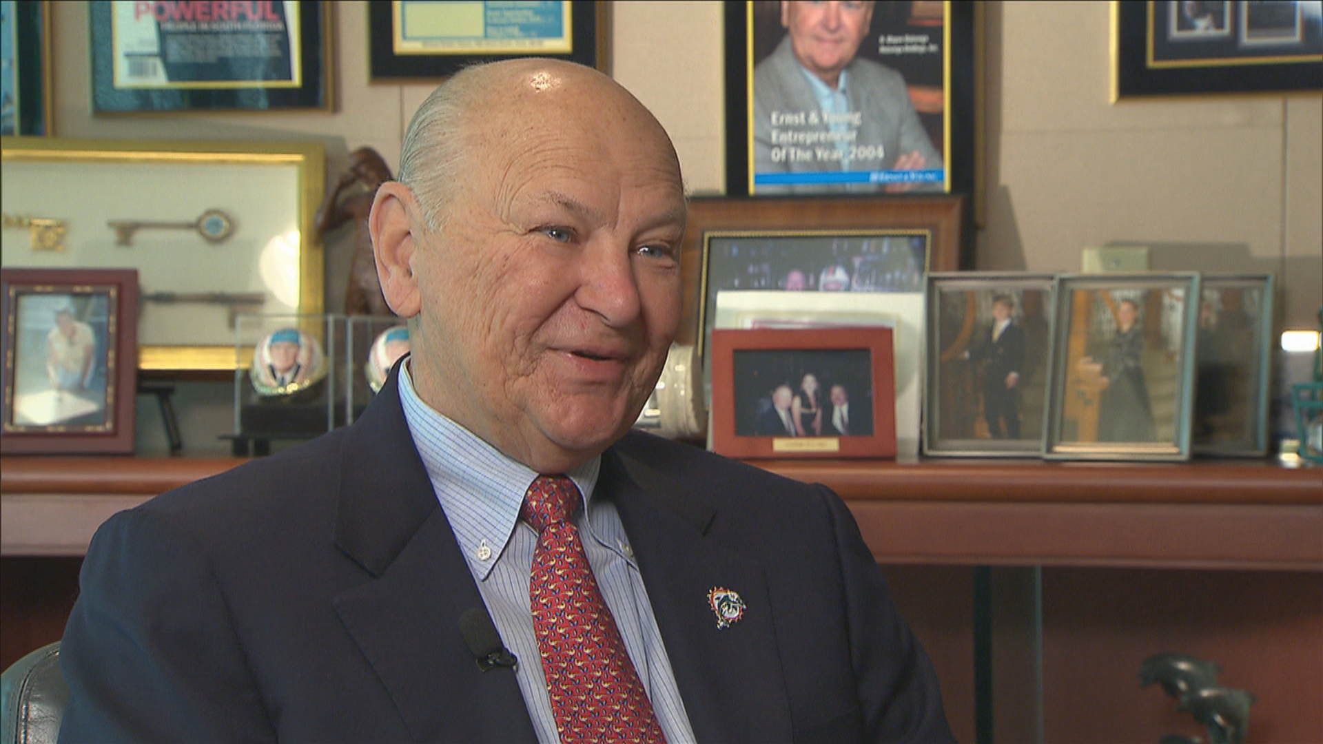 Miami Dolphins owner H. Wayne Huizenga faces reporters Monday, Jan