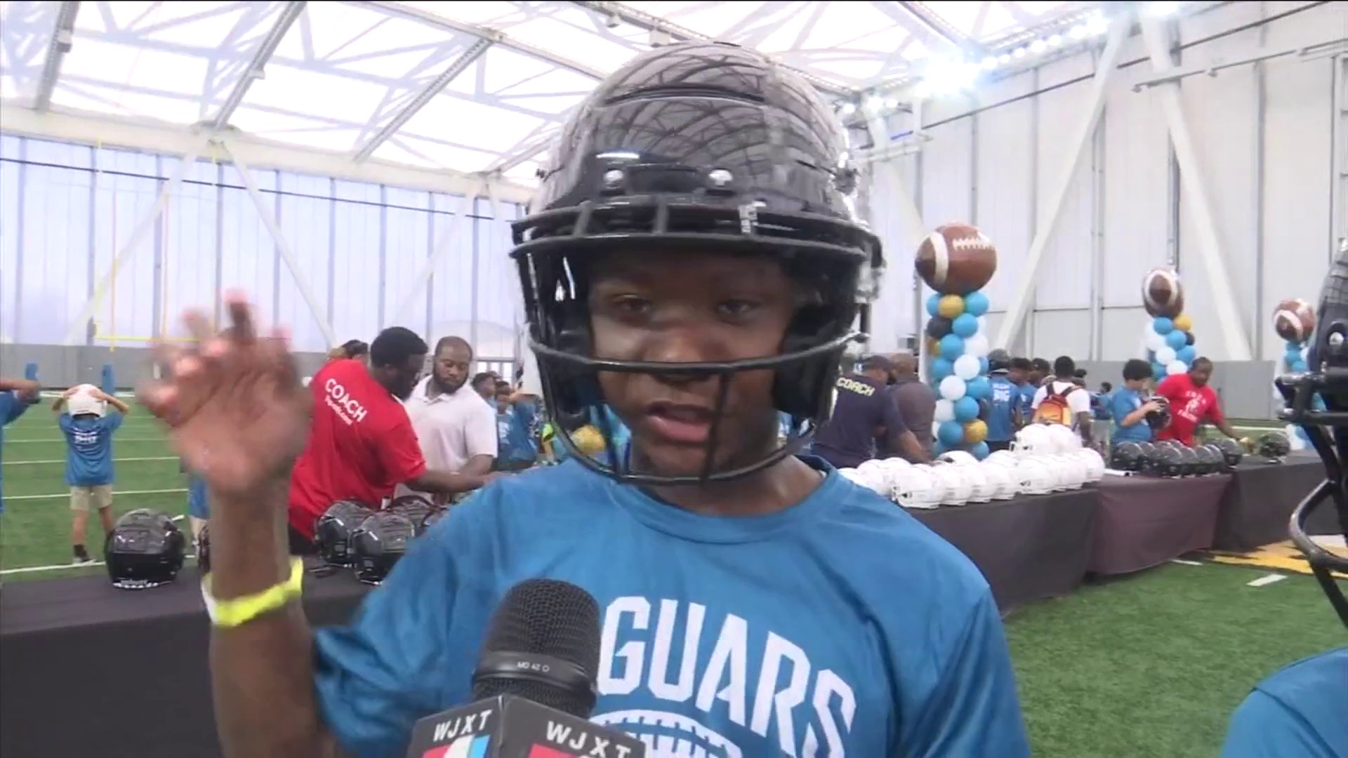 Jaguars Donate Helmets To Local Youth Football Teams