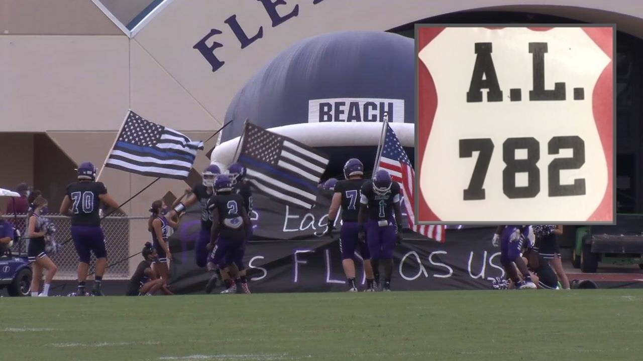 Why are players, coaches wearing decals of different flags in the