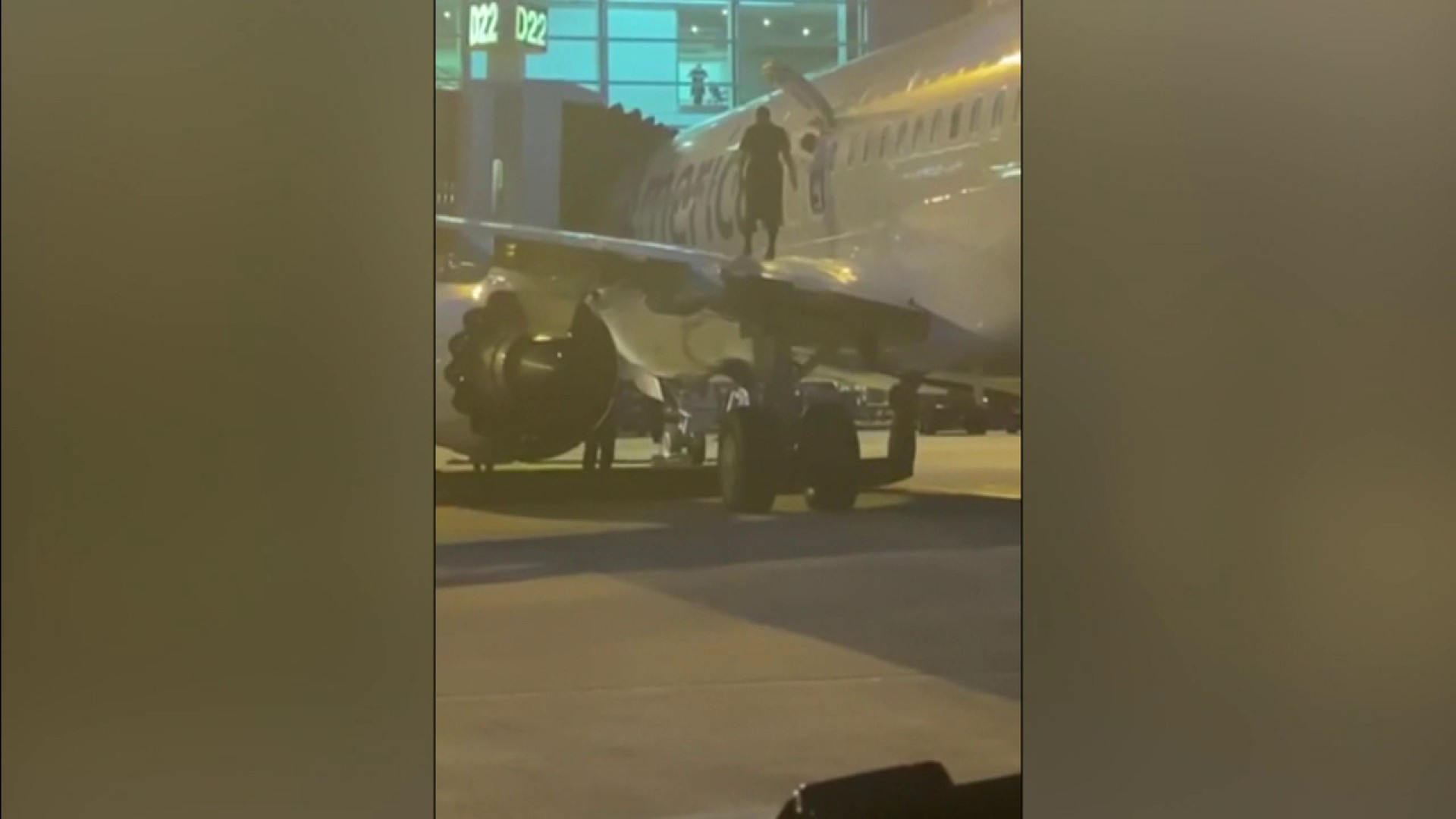 Passenger on flight arriving in Miami from Colombia opens plane door, jumps  on wing