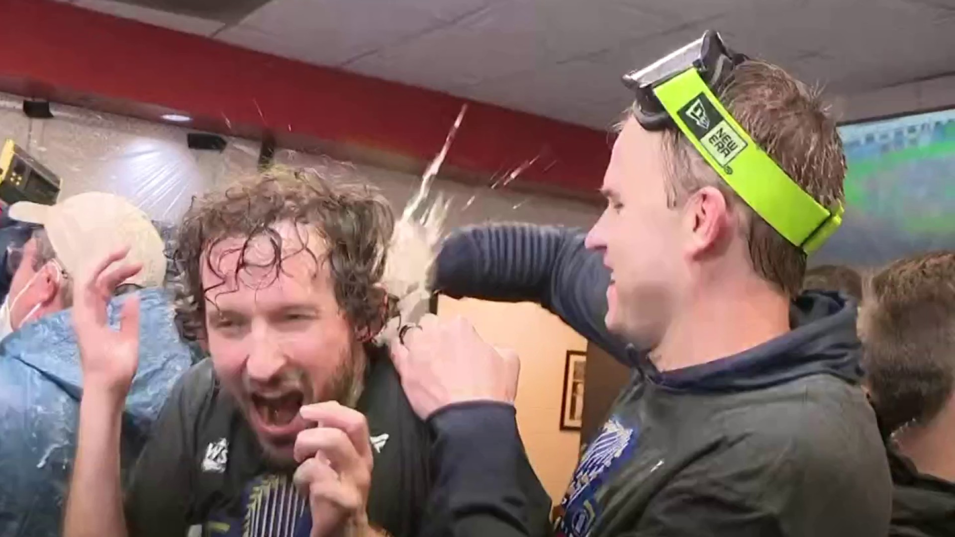 Astros celebrate division clincher in champagne-soaked clubhouse